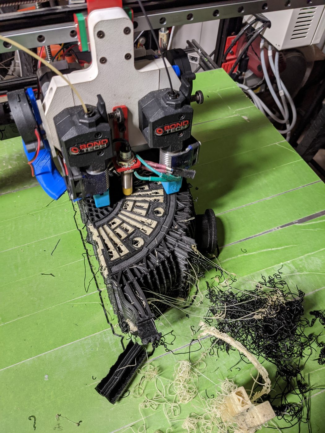 Dual-extruder printer printing a black mechanical part