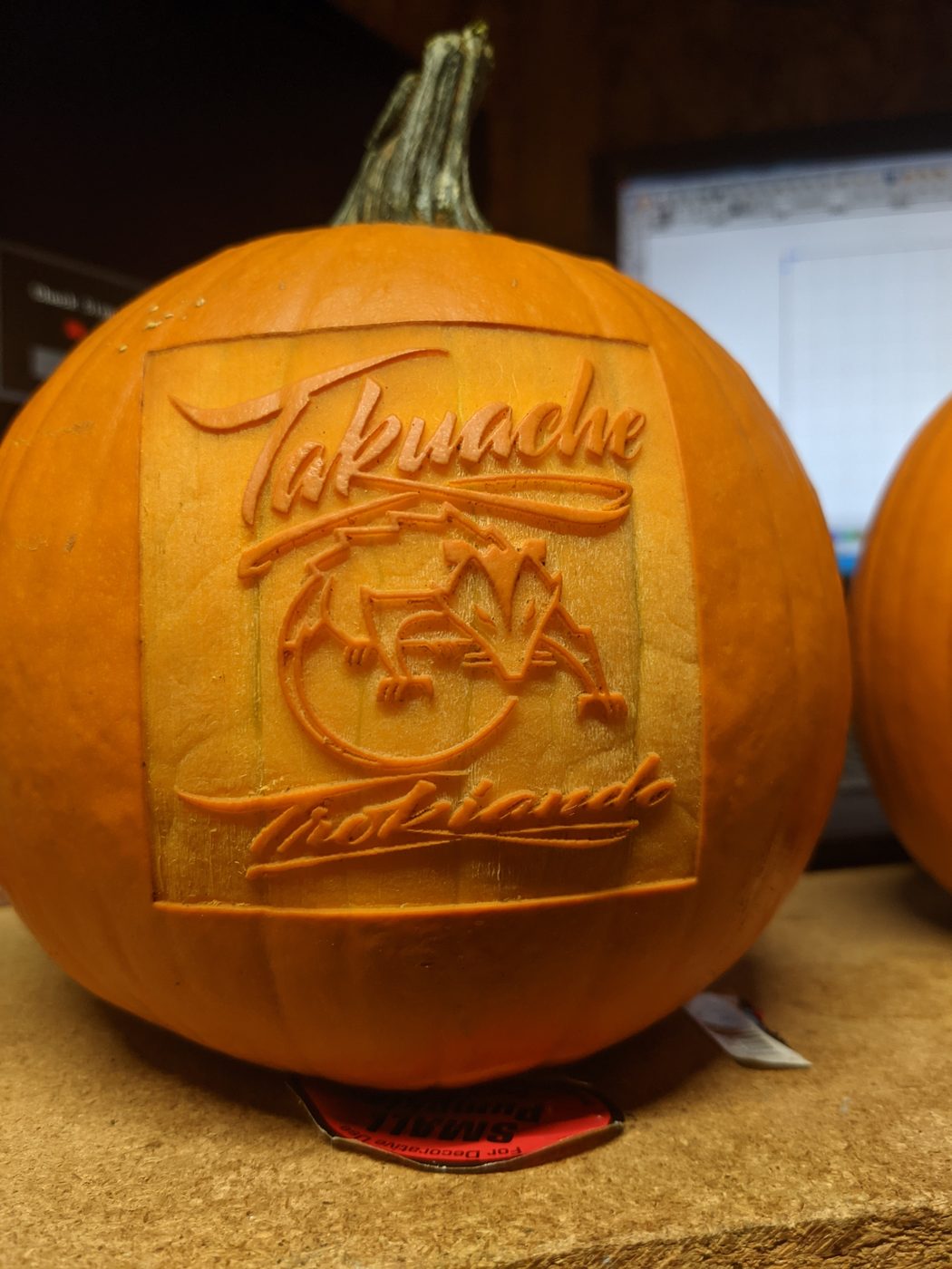 Pumpkin carved with Takuache Trokiante design in relief